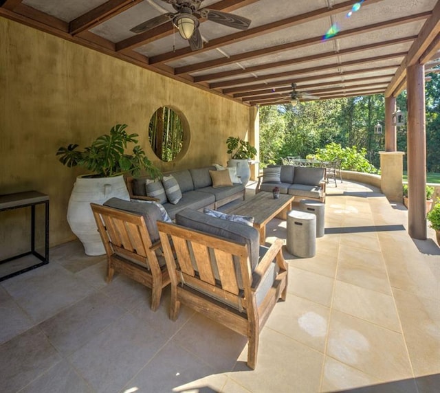 view of patio / terrace with an outdoor living space and ceiling fan