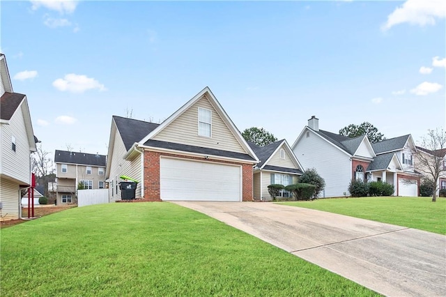 view of front of home with a garage and a front lawn