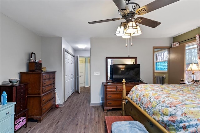 bedroom featuring hardwood / wood-style flooring and ceiling fan