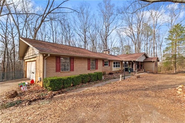 ranch-style home with a garage