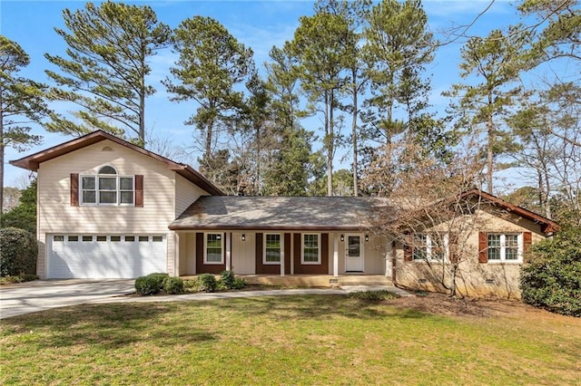 view of front of house with a porch, an attached garage, a front yard, crawl space, and driveway