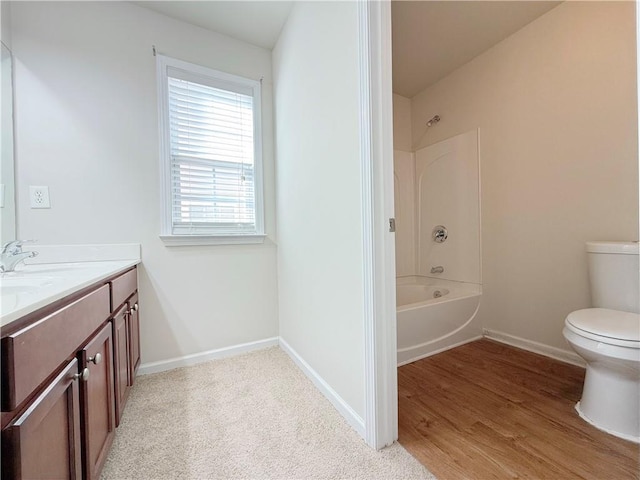 full bathroom with vanity, shower / washtub combination, and toilet