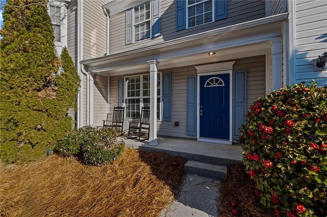 doorway to property featuring a porch