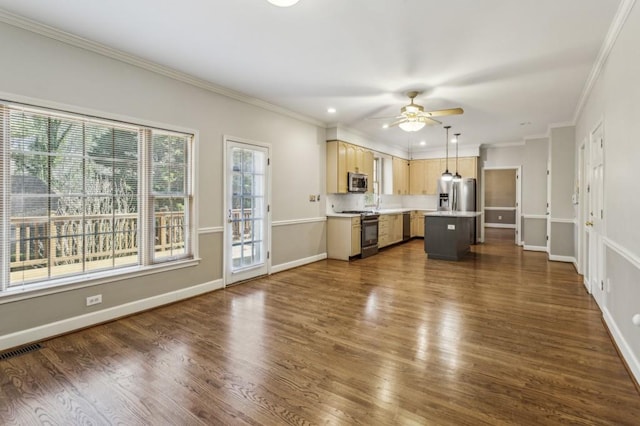 kitchen with a kitchen island, dark hardwood / wood-style floors, hanging light fixtures, ceiling fan, and stainless steel appliances