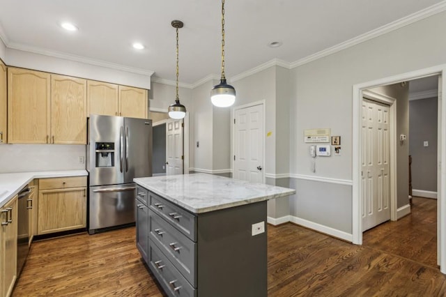 kitchen with light stone counters, gray cabinets, a kitchen island, pendant lighting, and stainless steel appliances