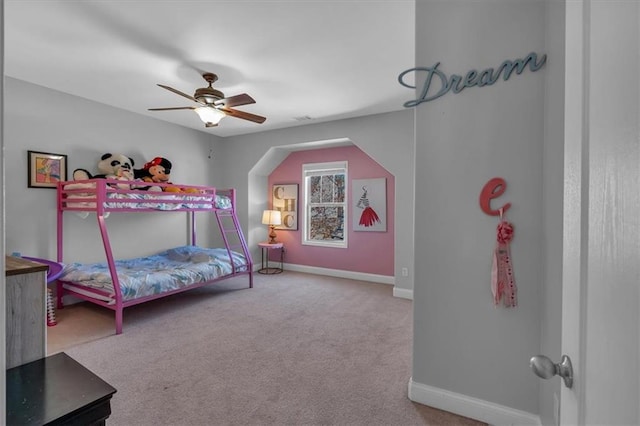 bedroom with carpet, baseboards, and ceiling fan