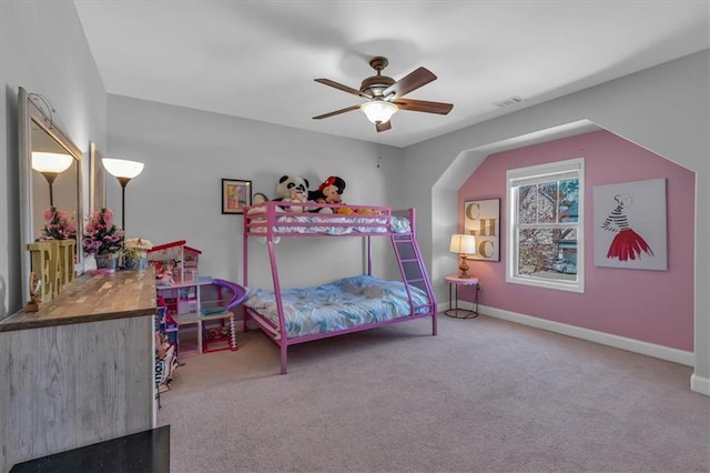 bedroom featuring carpet floors, baseboards, and ceiling fan
