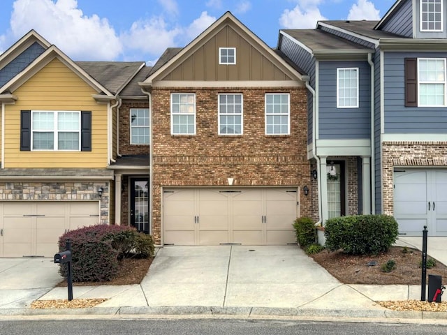 townhome / multi-family property featuring a garage
