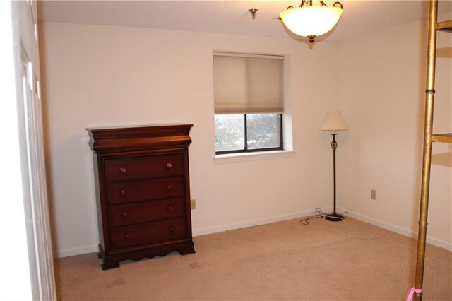 unfurnished bedroom featuring two closets