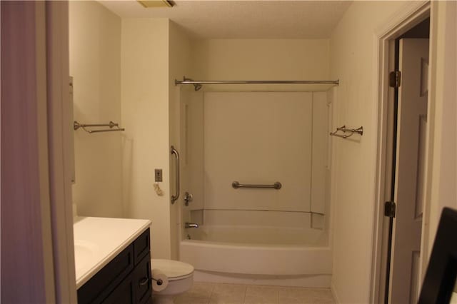 full bathroom featuring shower / bath combination, a textured ceiling, vanity, tile patterned flooring, and toilet