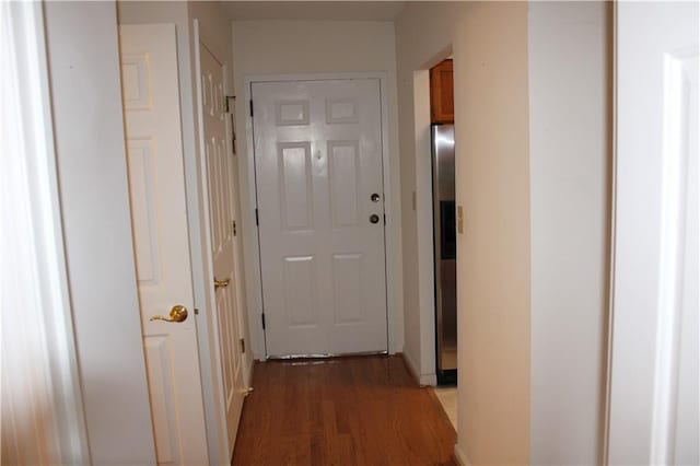 corridor featuring dark hardwood / wood-style floors