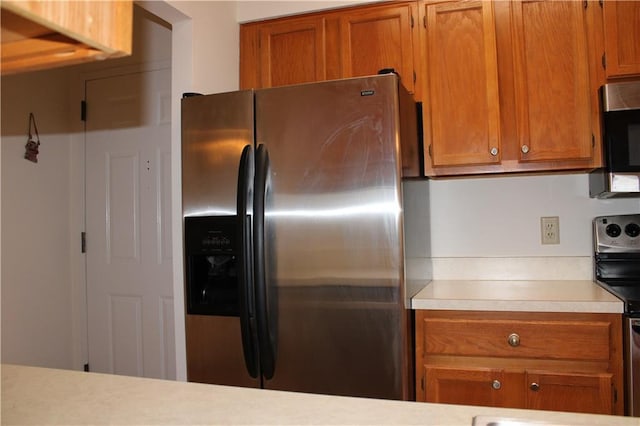 kitchen with appliances with stainless steel finishes