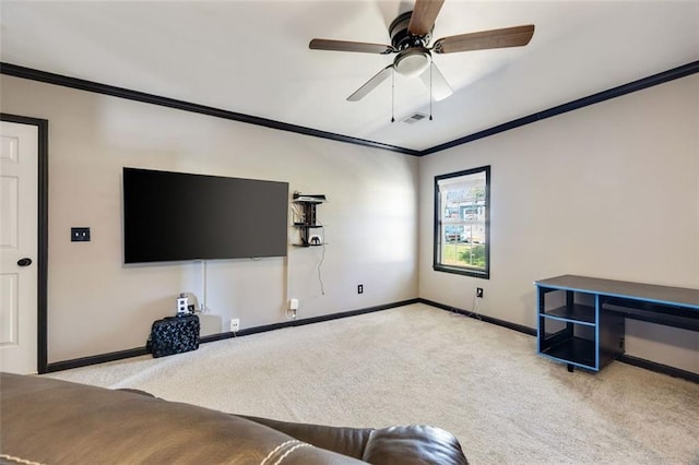 living room featuring ornamental molding, light colored carpet, and ceiling fan