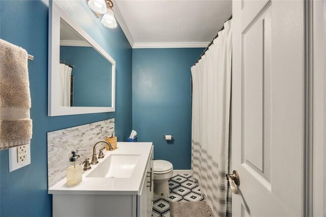 office with crown molding, light colored carpet, and ceiling fan