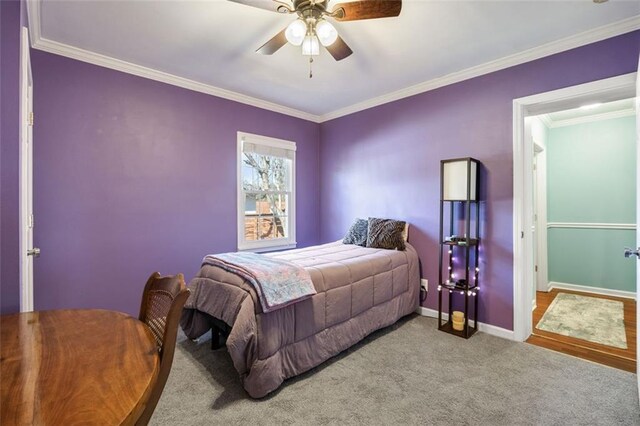 bathroom with crown molding, vanity, and toilet