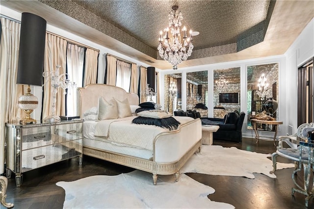 538 Sarabrook Pl, Sandy Springs, GA 30342 - bedroom featuring a tray ceiling and a chandelier