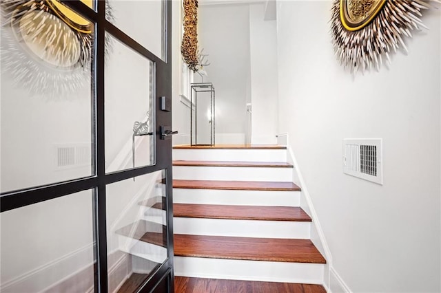 538 Sarabrook Pl, Sandy Springs, GA 30342 - staircase featuring wood finished floors and baseboards