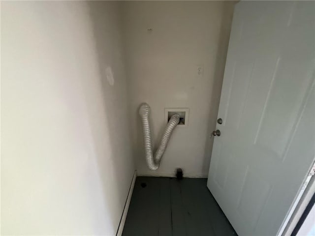 laundry room featuring electric dryer hookup, hookup for a washing machine, and a baseboard heating unit