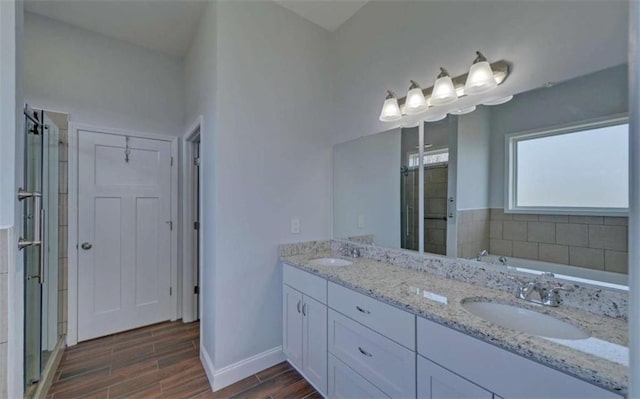 bathroom featuring vanity and separate shower and tub