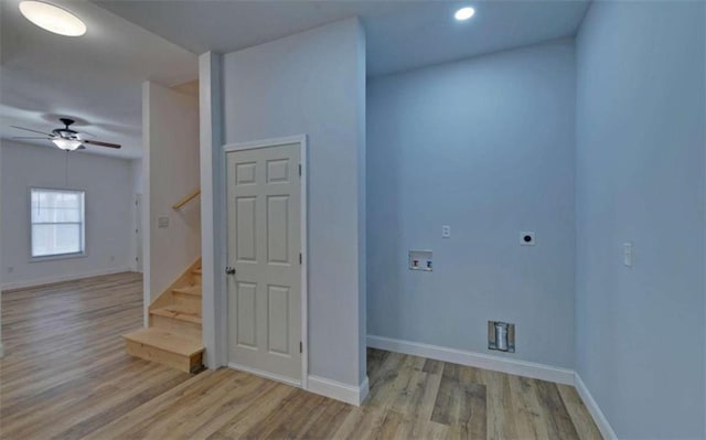 interior space with wood-type flooring and ceiling fan