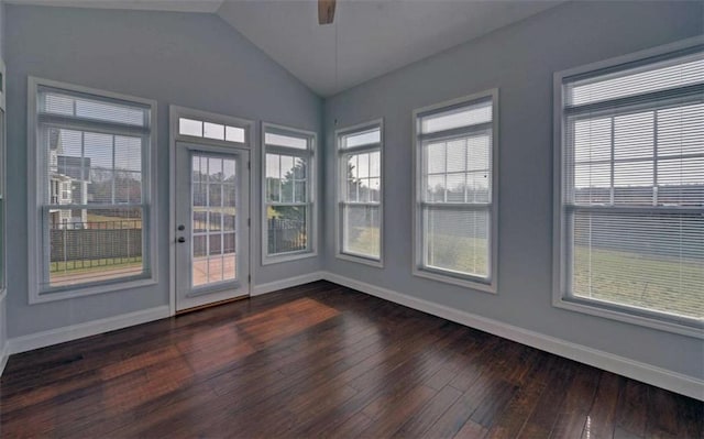 unfurnished sunroom with vaulted ceiling and ceiling fan