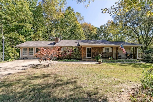 255 Shipp Cir, Hiram, GA 30141 - ranch-style home featuring driveway, a chimney, and a front lawn