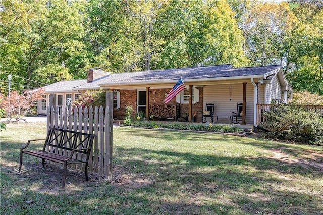 255 Shipp Cir, Hiram, GA 30141 - ranch-style home featuring a front lawn and a chimney