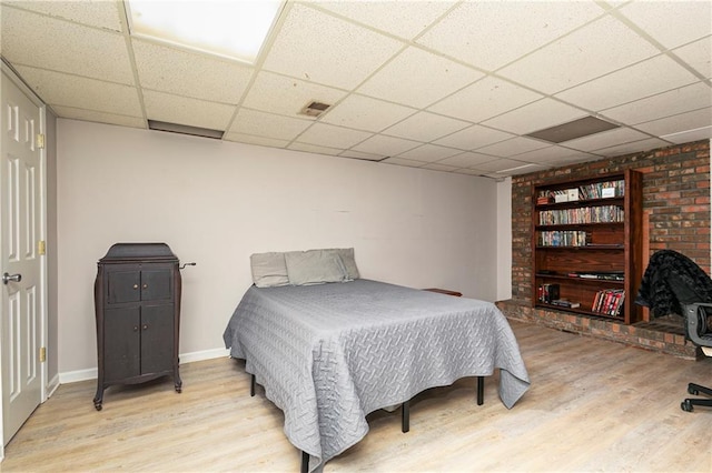 255 Shipp Cir, Hiram, GA 30141 - bedroom with wood finished floors, a paneled ceiling, and baseboards