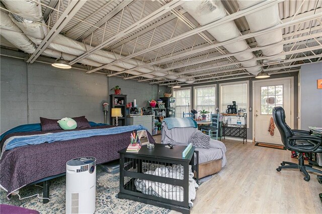 255 Shipp Cir, Hiram, GA 30141 - bedroom featuring wood finished floors and concrete block wall