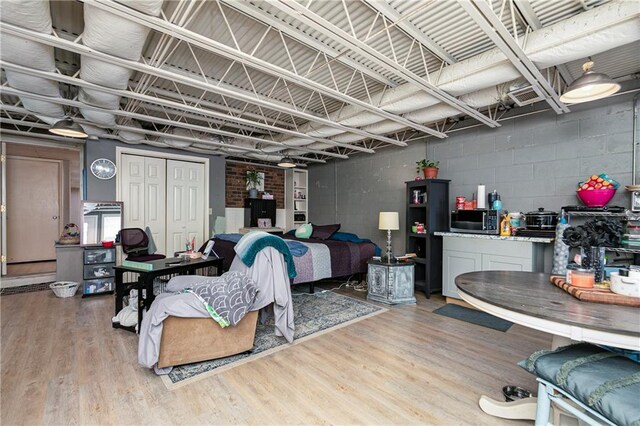 255 Shipp Cir, Hiram, GA 30141 - living area featuring wood finished floors and concrete block wall