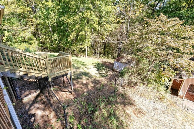 255 Shipp Cir, Hiram, GA 30141 - view of yard featuring a deck and a wooded view