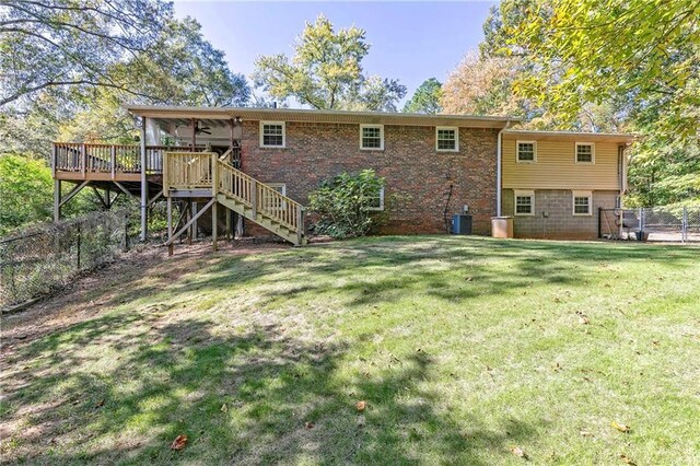 255 Shipp Cir, Hiram, GA 30141 - rear view of house with stairway, a wooden deck, brick siding, and central air condition unit