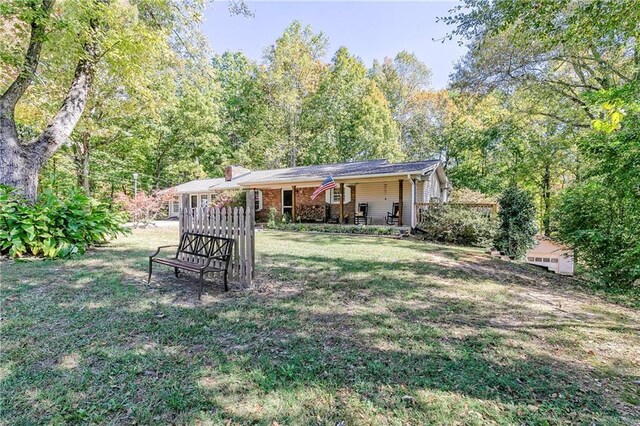 255 Shipp Cir, Hiram, GA 30141 - view of grassy yard featuring covered porch