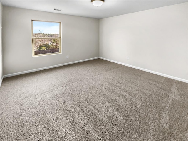 unfurnished room with carpet floors