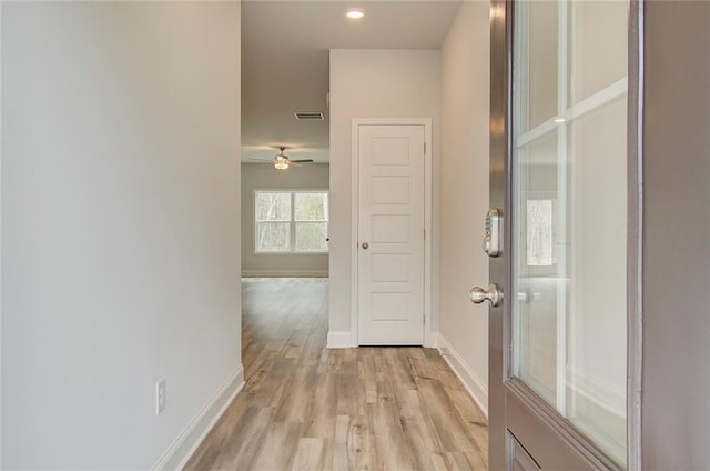 hallway featuring light hardwood / wood-style flooring