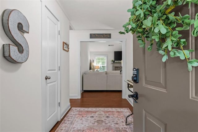 1081 Oak Hill Ln, Madison, GA 30650 - foyer featuring wood finished floors and ornamental molding