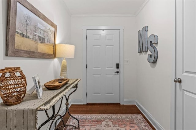 1081 Oak Hill Ln, Madison, GA 30650 - foyer with dark wood finished floors, baseboards, and ornamental molding