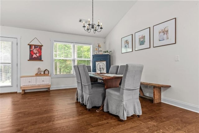 1081 Oak Hill Ln, Madison, GA 30650 - dining space with a chandelier, wood finished floors, lofted ceiling, and baseboards