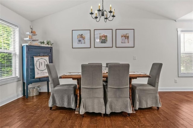 1081 Oak Hill Ln, Madison, GA 30650 - dining area with lofted ceiling, a chandelier, wood finished floors, and healthy amount of natural light