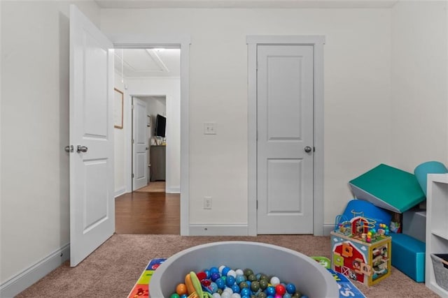 1081 Oak Hill Ln, Madison, GA 30650 - game room with carpet floors, attic access, and baseboards