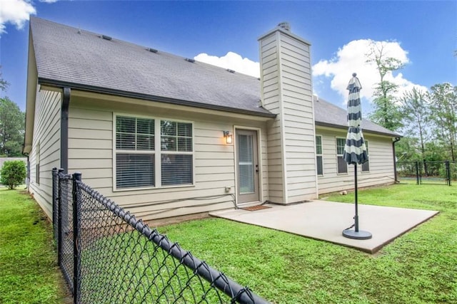 1081 Oak Hill Ln, Madison, GA 30650 - rear view of property with a patio area, a chimney, and a shingled roof