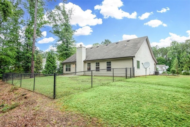 1081 Oak Hill Ln, Madison, GA 30650 - rear view of property featuring a chimney and cooling unit
