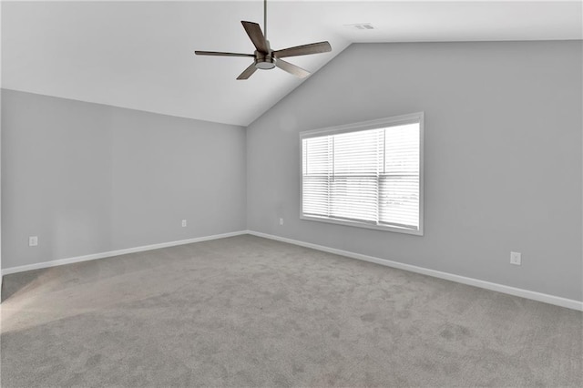 spare room featuring light carpet, baseboards, visible vents, and a ceiling fan