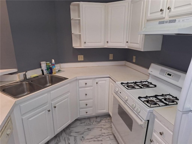 kitchen featuring white cabinetry, white gas range, and sink