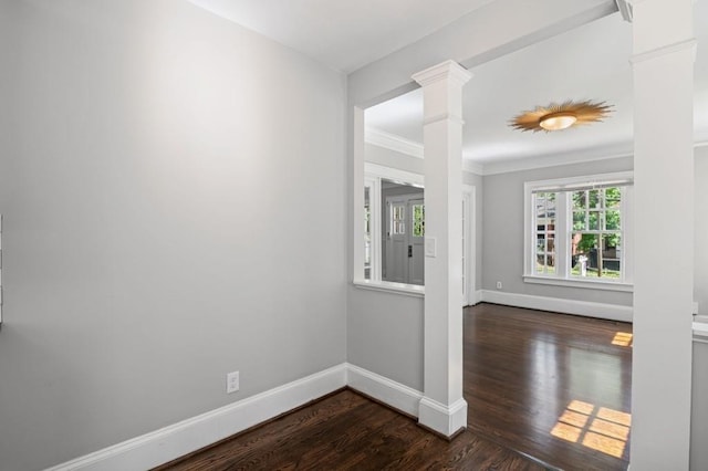 1585 Olympian Cir SW, Atlanta, GA 30310 - empty room featuring ornate columns, dark wood-style flooring, and ornamental molding