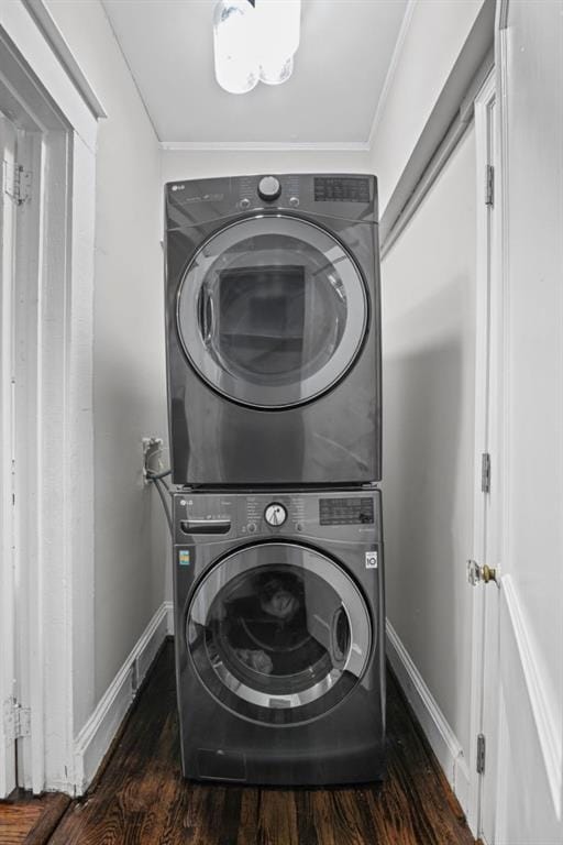 1585 Olympian Cir SW, Atlanta, GA 30310 - washroom with estacked washer and dryer, wood finished floors, and ornamental molding