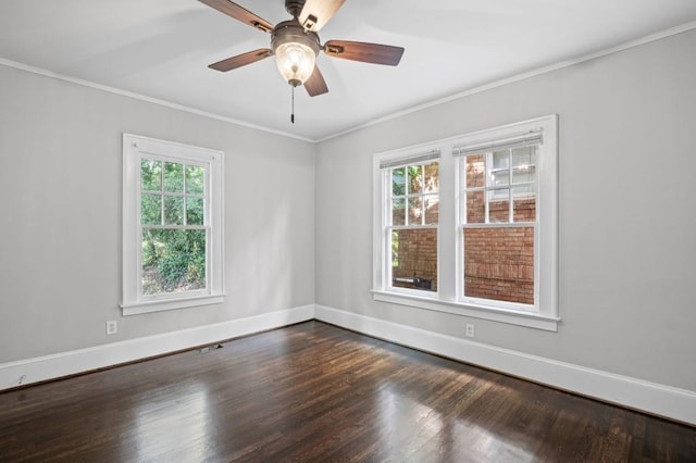 1585 Olympian Cir SW, Atlanta, GA 30310 - empty room featuring healthy amount of natural light, dark wood finished floors, ornamental molding, and a ceiling fan