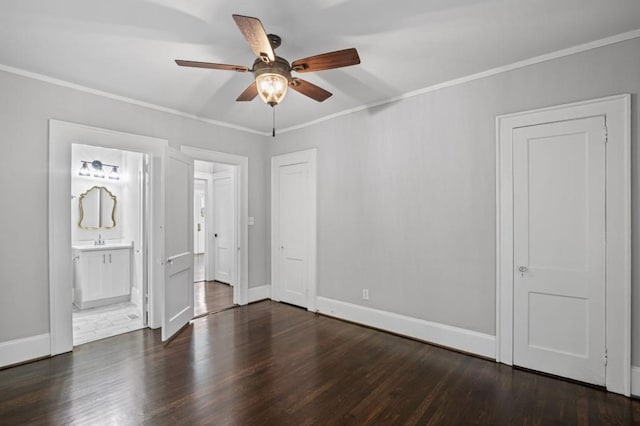 1585 Olympian Cir SW, Atlanta, GA 30310 - unfurnished bedroom with crown molding, dark wood finished floors, ensuite bath, and ceiling fan