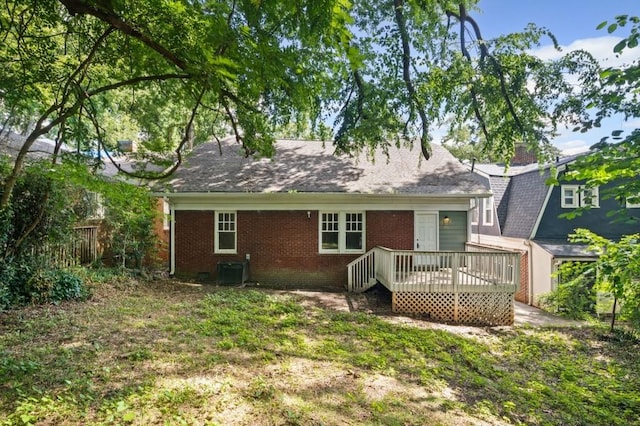 1585 Olympian Cir SW, Atlanta, GA 30310 - back of house with a deck, brick siding, and roof with shingles