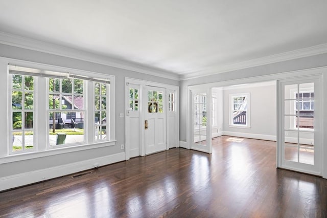 1585 Olympian Cir SW, Atlanta, GA 30310 - foyer with plenty of natural light, dark wood-style floors, ornamental molding, and french doors